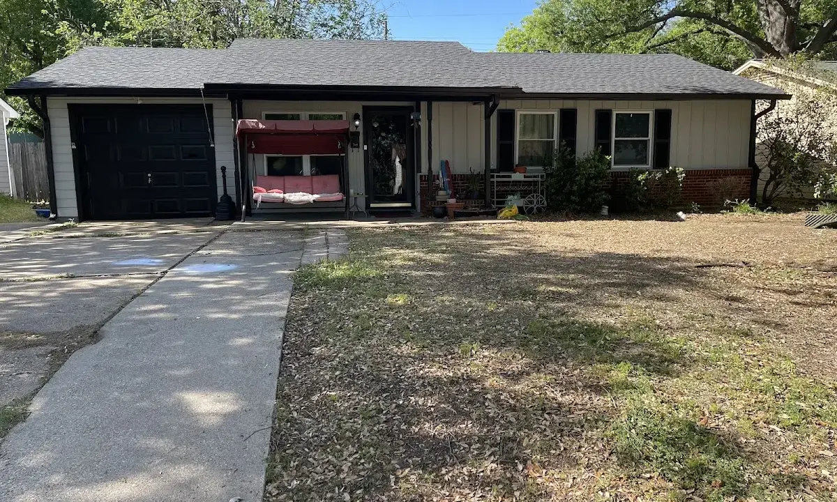 Wind Damage Roof Repair crew at work on a residential roof in Apopka